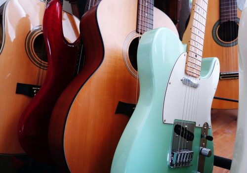 Guitars On A Guitar Rack Indoors